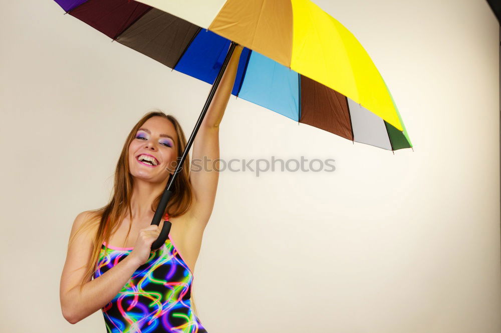 Similar – Image, Stock Photo young woman leans happily against a colourful wooden wall