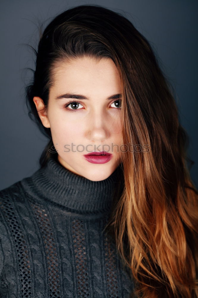 Similar – Portrait of a young teenager girl standing looking throughout the window