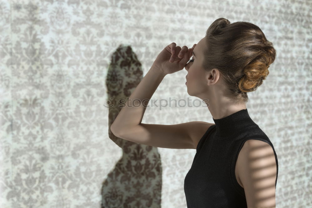 Similar – Image, Stock Photo Young woman with long legs sits barefoot on the couch