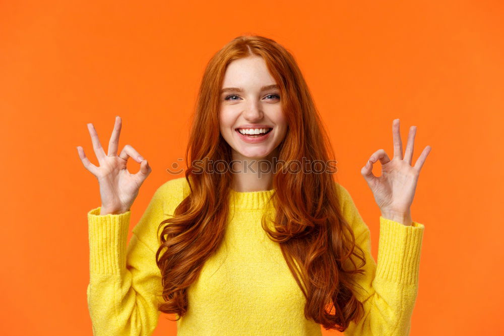 Similar – Image, Stock Photo Portrait of beautiful young woman using mobile phone in the street.