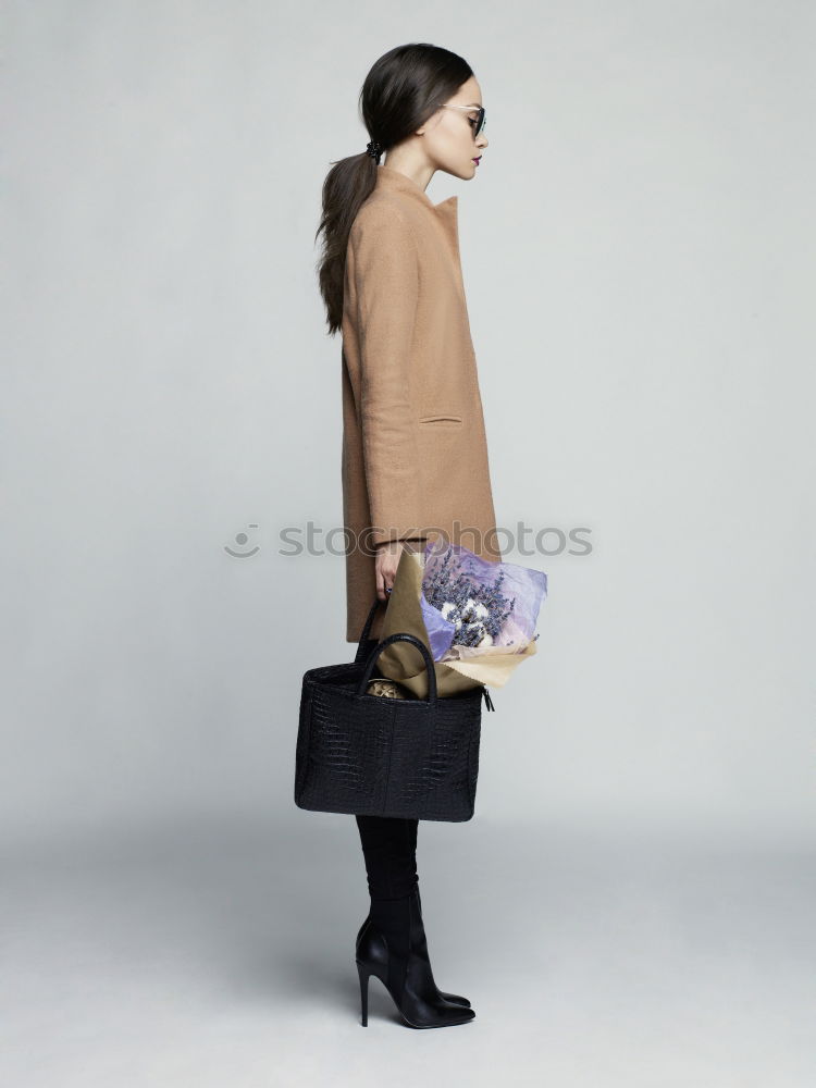 Similar – Image, Stock Photo Woman standing on the street with blur background