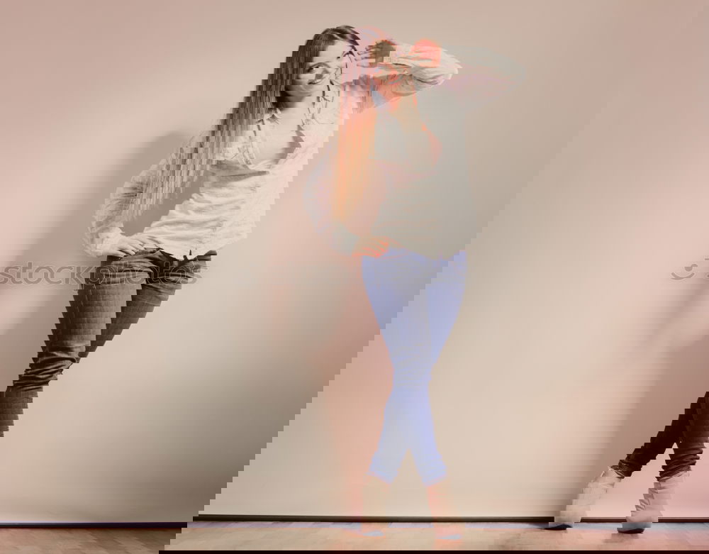 Similar – Image, Stock Photo Stylish young woman standing at metal wall