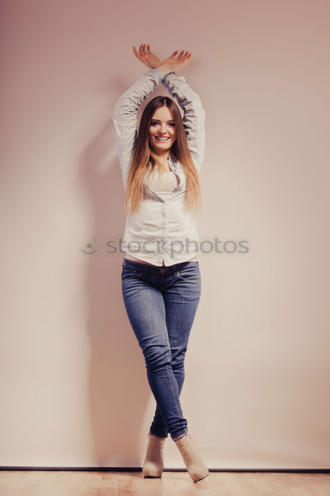 Similar – Image, Stock Photo Girl with blue eyes smiling on brick wall.