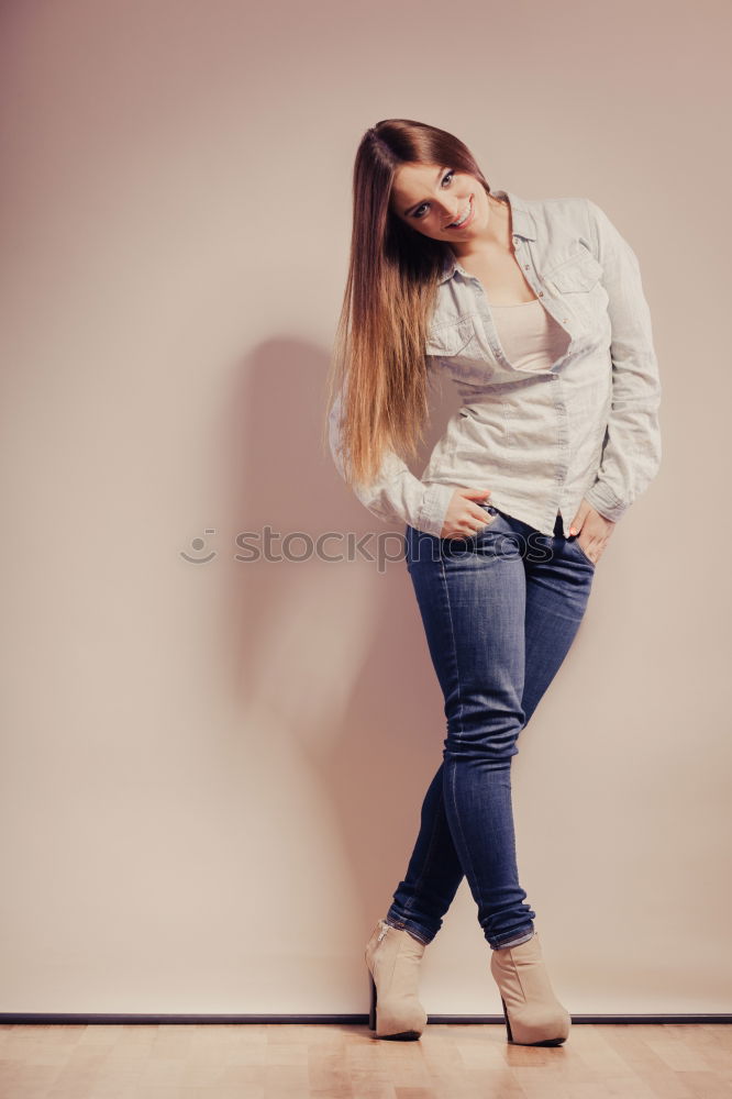 Similar – Image, Stock Photo young redhead woman with curls and freckles sprints barefoot in hot pants in front of white door and smiles