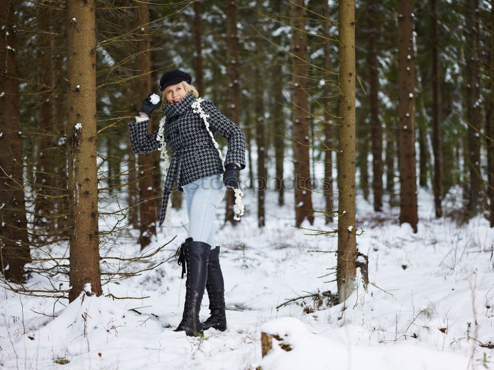 Similar – Image, Stock Photo Cheerful woman having fun in winter forest