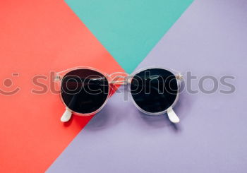Similar – Image, Stock Photo Top view of green and yellow sunglasses