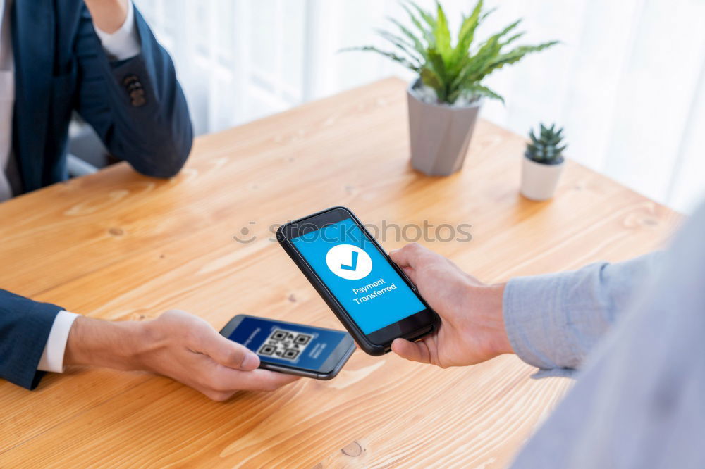 Similar – Image, Stock Photo Man paying with smartphone for online shopping. Paying using fast secure payment system. Paying bills using express payment technology. Ordering product online using smartphone. Confirmation payment successful displayed in store app