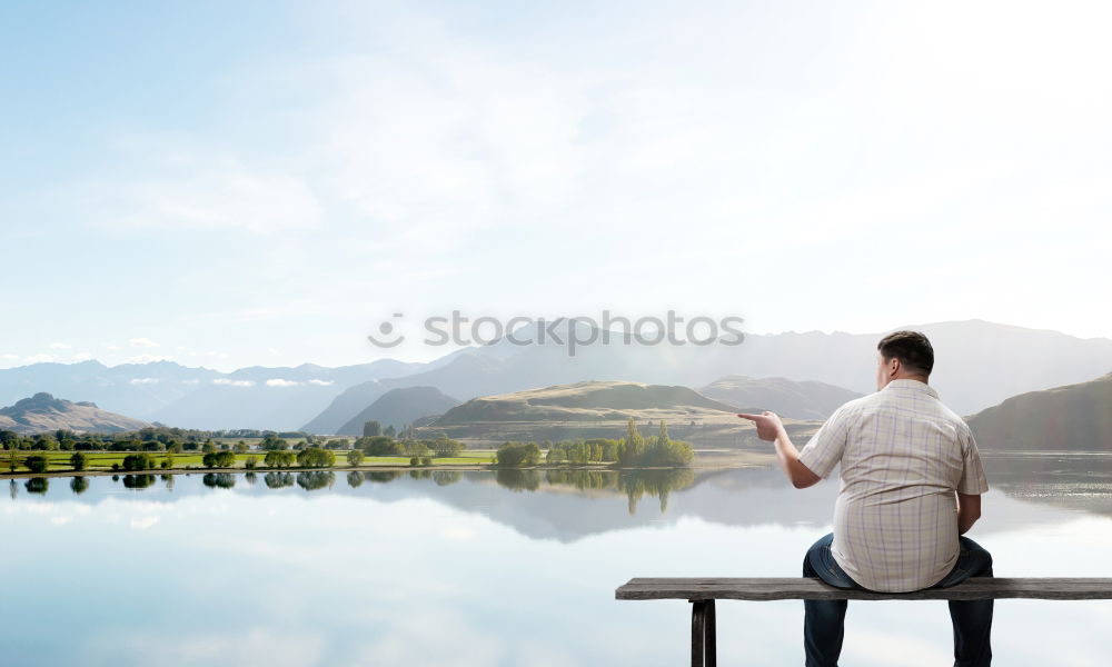 Similar – Image, Stock Photo Cat sitting next to eating man in the alpine hut