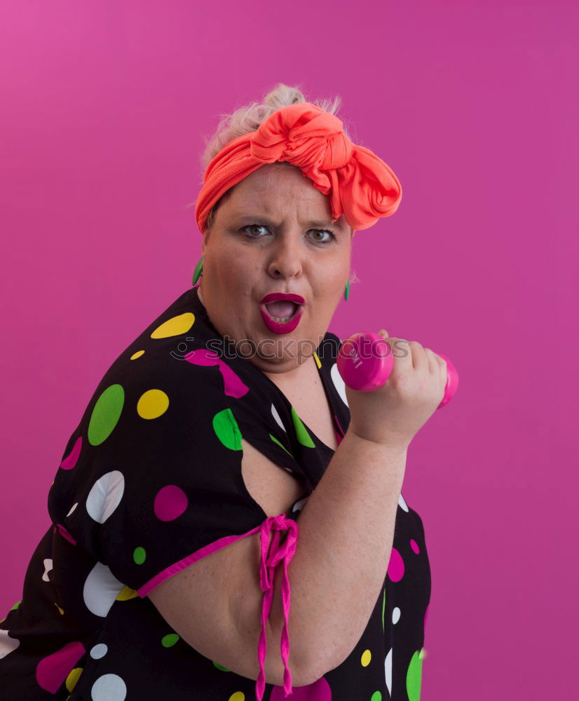 Image, Stock Photo young woman doing facial expressions against a pink background