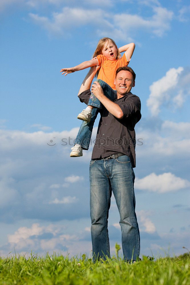 Similar – Father and son playing in the park at the day time.