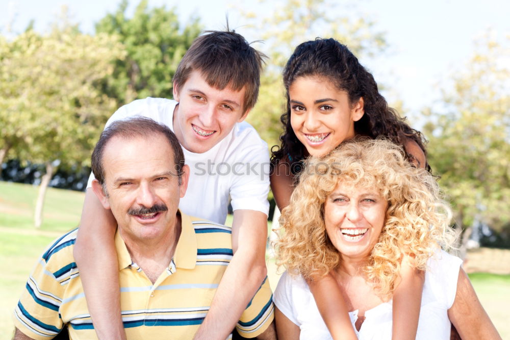 Similar – Happy family in a urban park playing with tablet computer