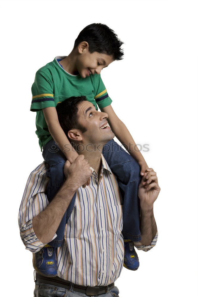 Similar – sad son hugging his dad near wall at the day time