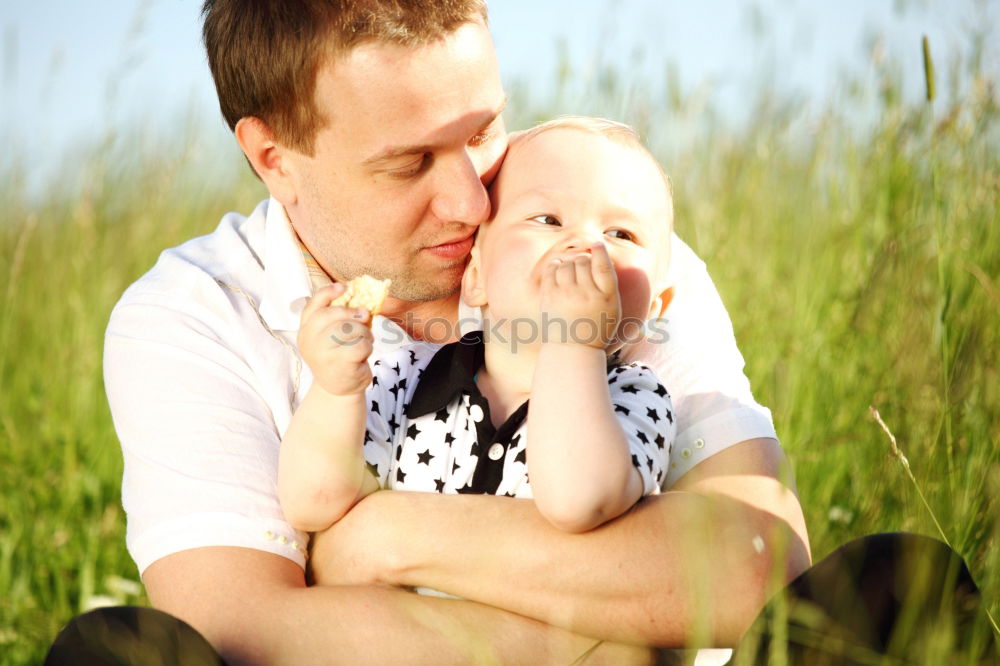 Similar – Father and daughter playing at the park at the day time.