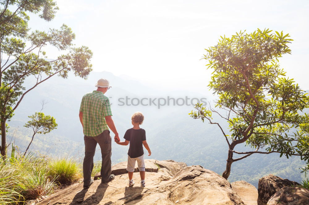 Image, Stock Photo Happy family standing near the lake at the day time.