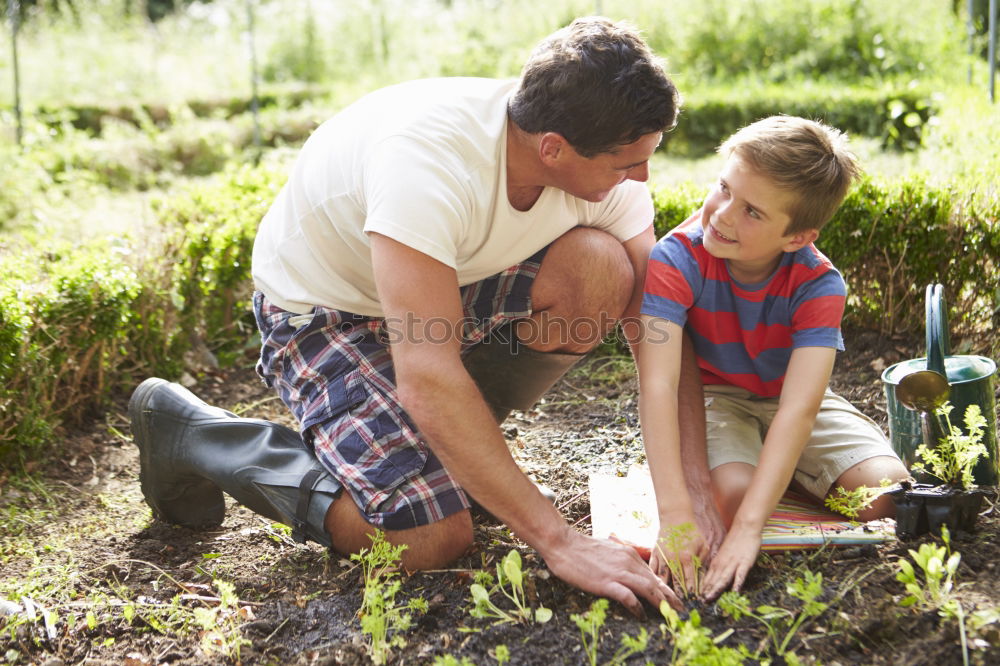 Similar – father and daughter fixing problems with bicycle