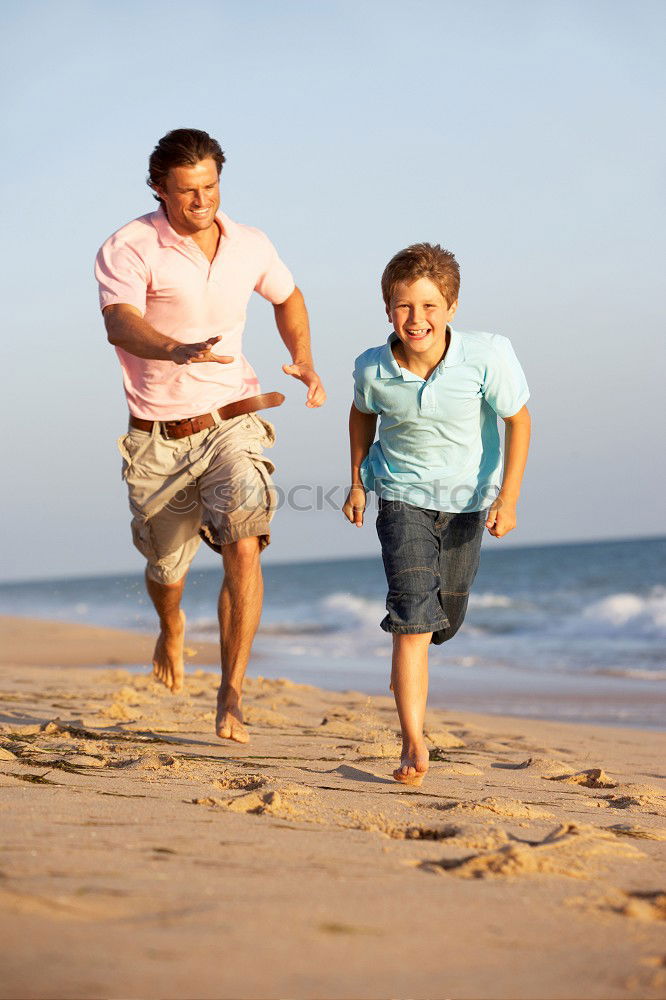 Similar – Image, Stock Photo Father and son standing on the road at the day time. Concept of tourism.