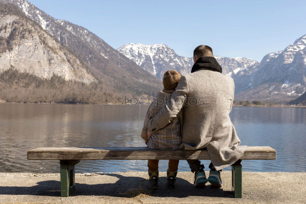 Similar – Image, Stock Photo A couple kissing in “the best bench in the world”
