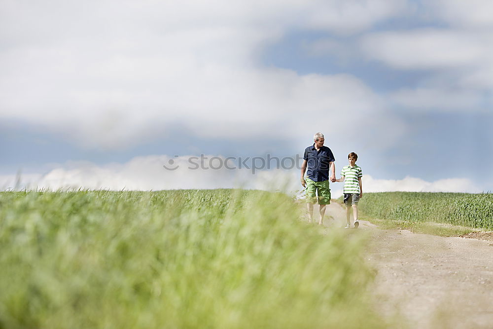 Similar – Grandparents and grandchildren walking outdoors