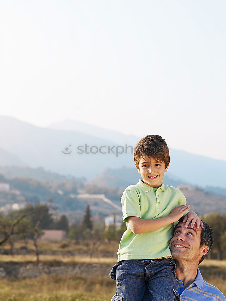 Similar – Image, Stock Photo Father holds up his little son