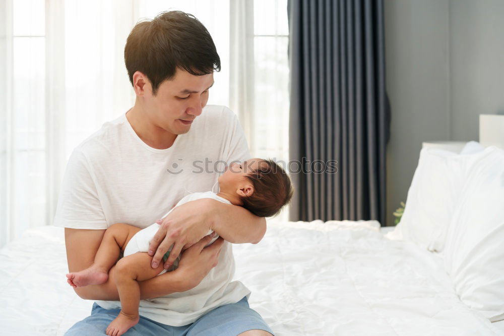 Similar – Mother breastfeed baby