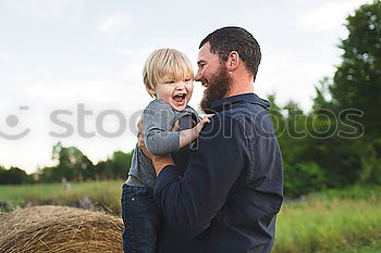 Similar – young dad and son playing outdoors at sunset. family concept