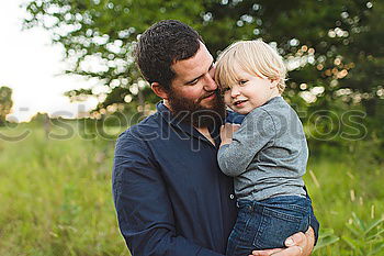 Similar – young dad and son playing outdoors at sunset. family concept