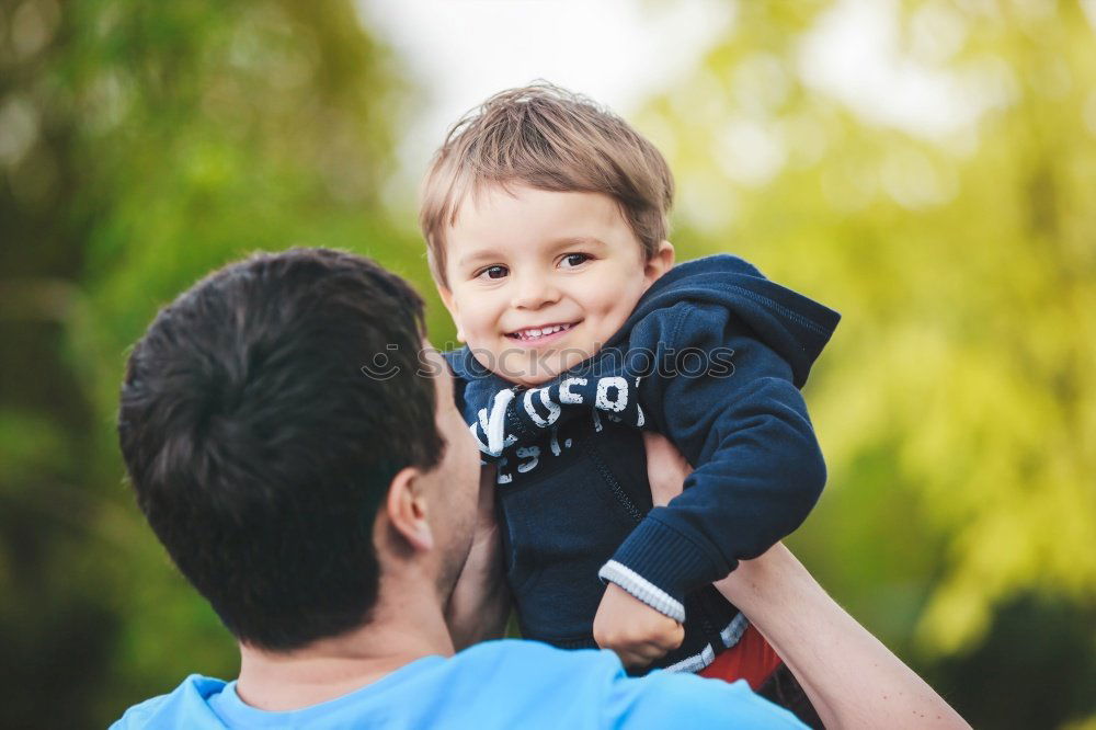 Similar – Image, Stock Photo Father and son playing at the park on bench at the day time.