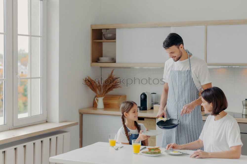 Similar – Image, Stock Photo little african girl is helping her mum preparing cupcake dough