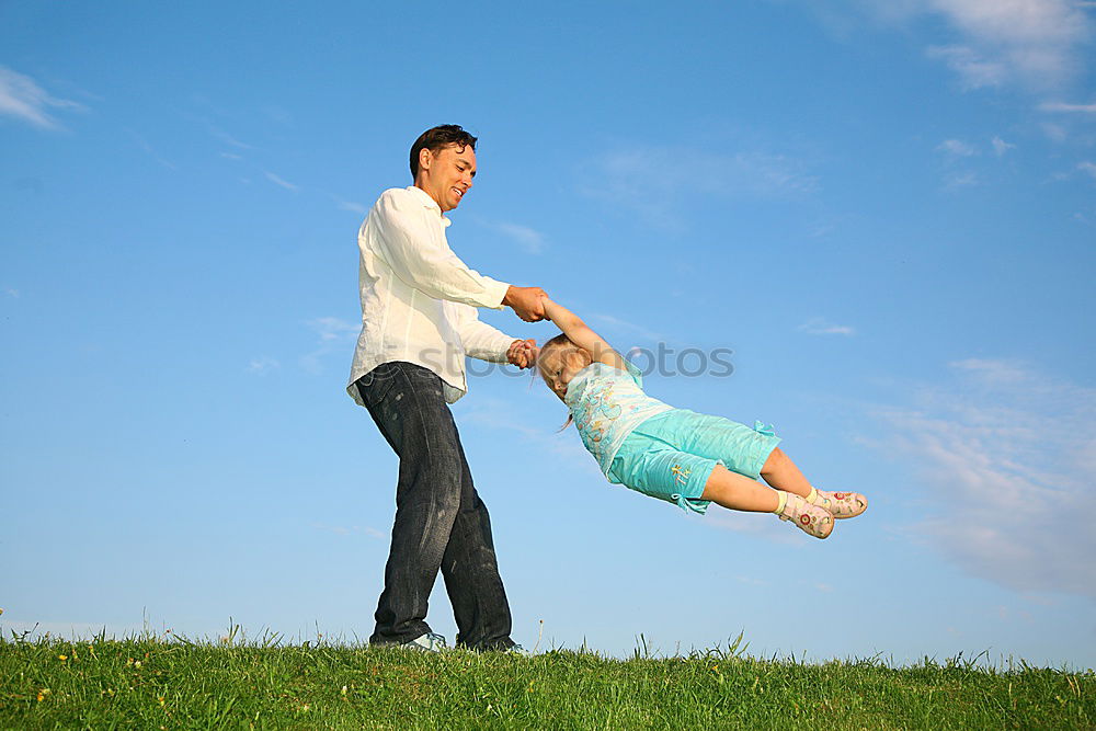 Similar – Image, Stock Photo Father and son playing on the beach at the day time.