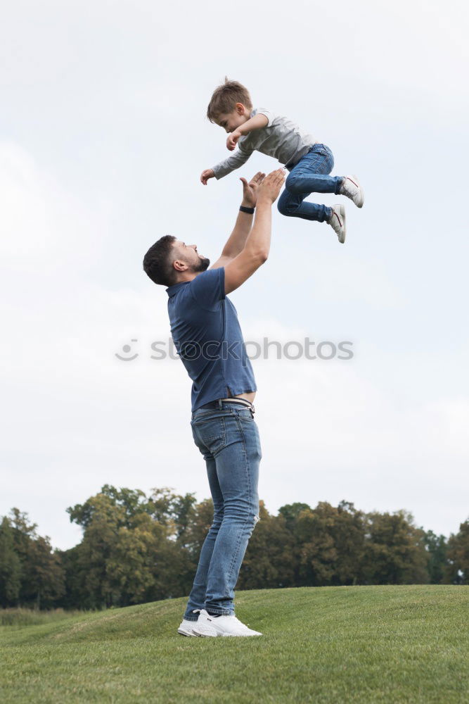 Similar – Image, Stock Photo Father holds up his little son