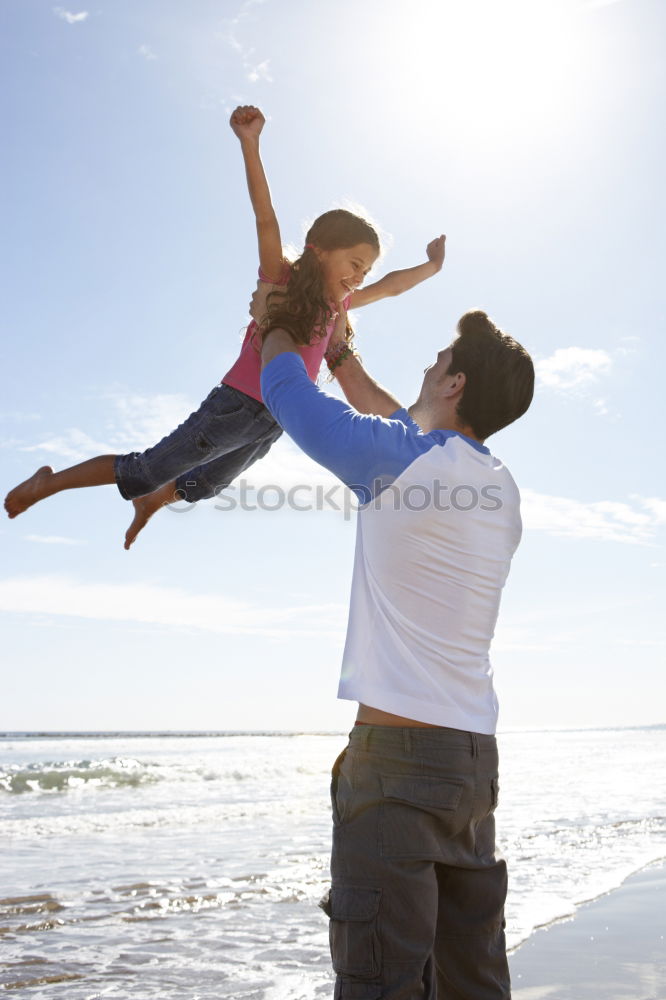 Similar – Image, Stock Photo Father and son playing on the beach at the day time.