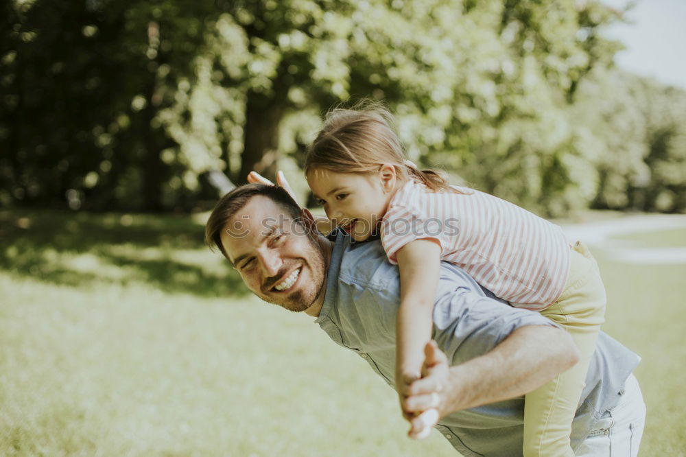 Similar – young dad and son playing outdoors at sunset. family concept