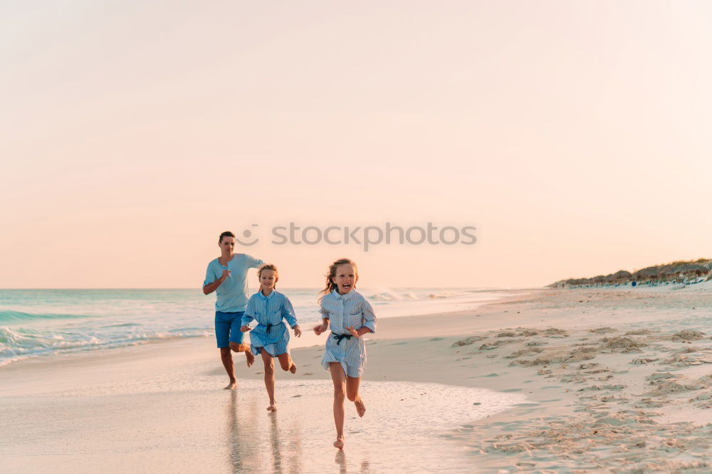 Similar – Image, Stock Photo Hipster friends cheering and dancing at beach party