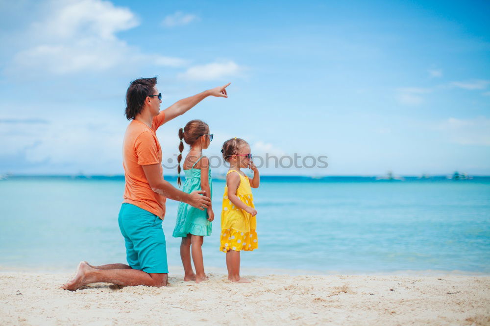 Similar – Mother and children playing on the beach at the day time. Concept of friendly family.