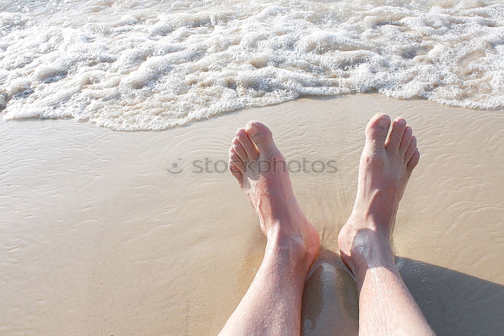 Similar – man takes a beach walk