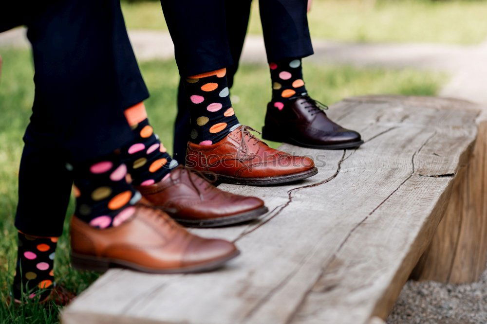 Similar – stylish men’s socks. Stylish suitcase, men’s legs, multicolored socks and new shoes. Concept of style, fashion, beauty and vacation