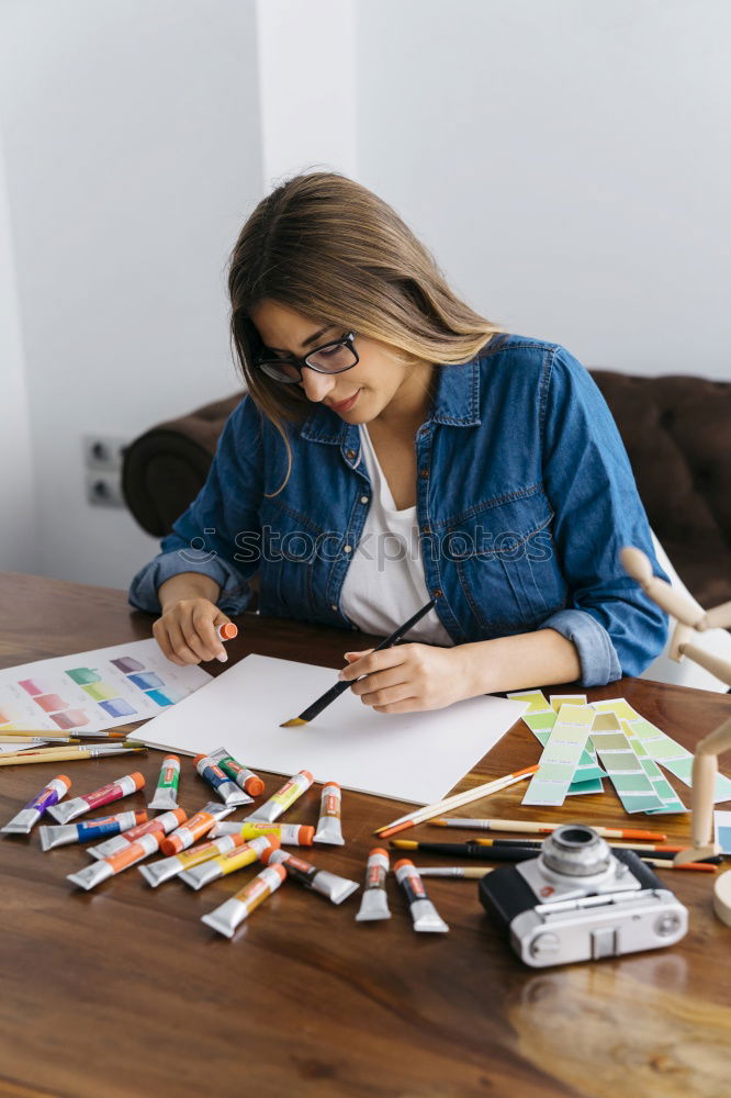 Similar – Image, Stock Photo Pretty woman writing at table