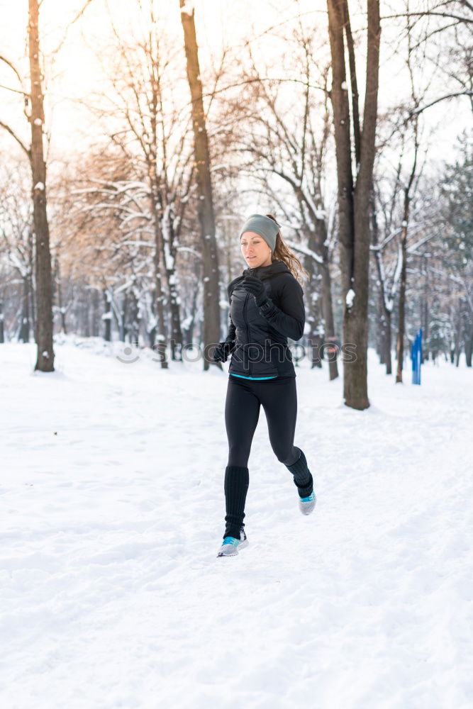 Similar – Image, Stock Photo Man jogging in winter clothing