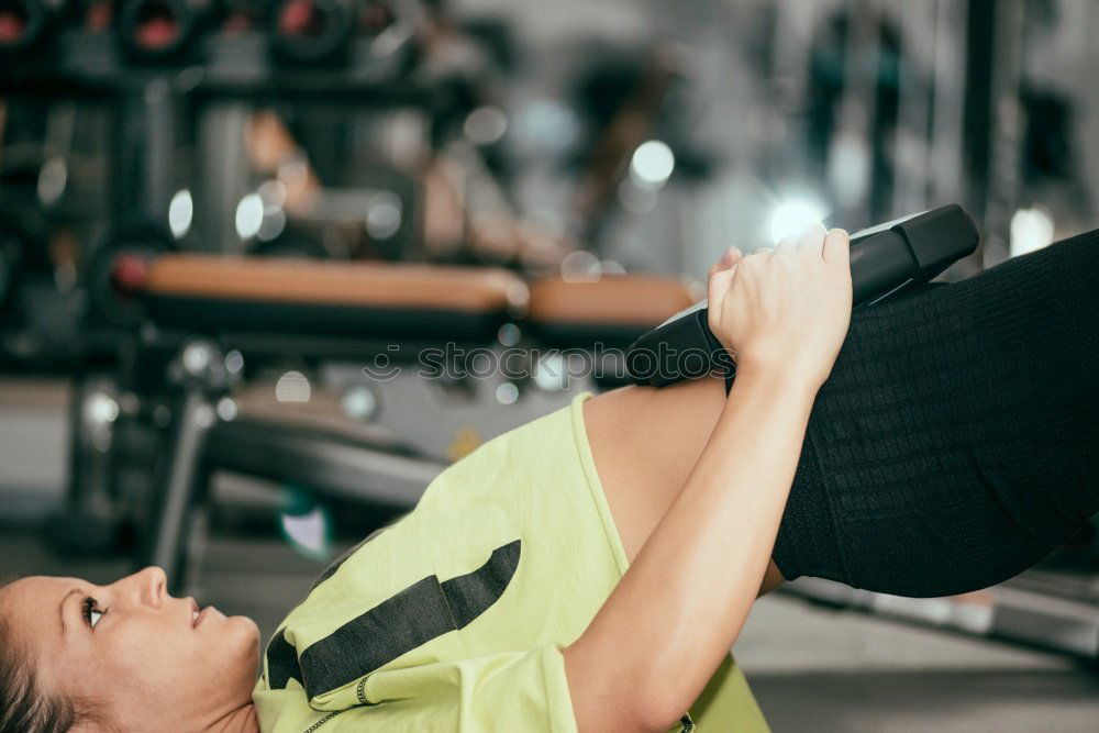 Similar – Image, Stock Photo Woman stretching legs in a fitness class