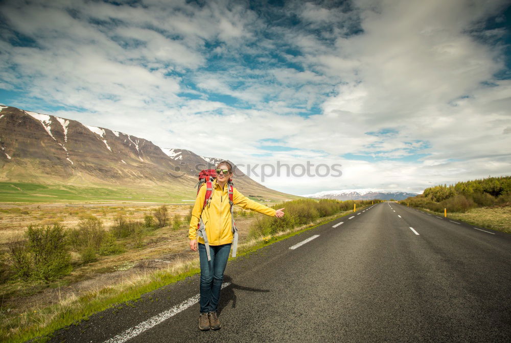 Similar – Foto Bild Trauriger Mann sitzt auf einem Koffer an einer einsamen Landstraße