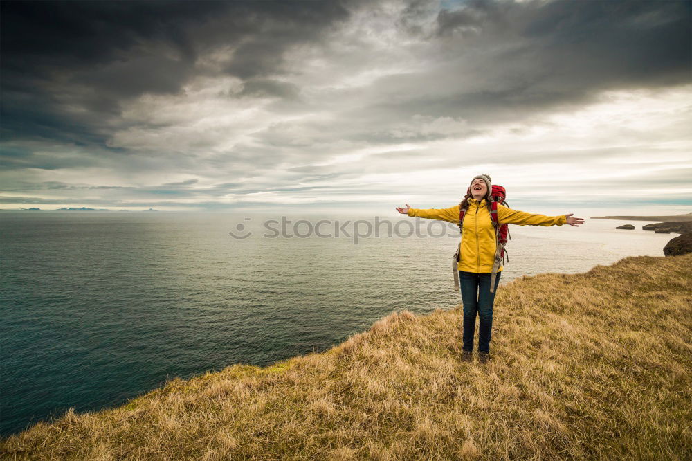 Similar – Woman standing on white cliffs by sea in England