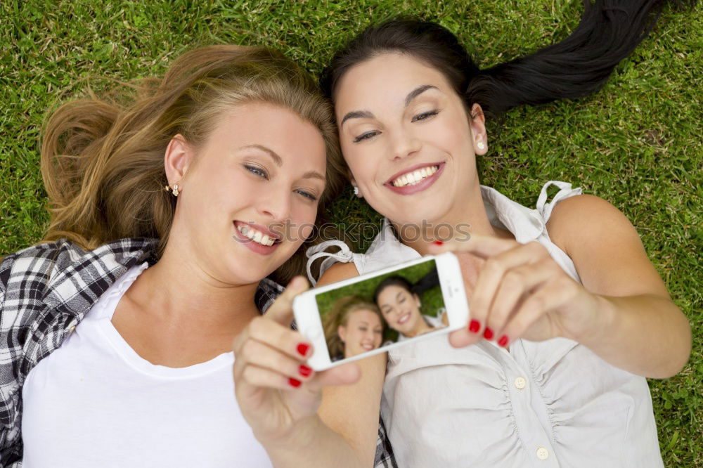 Similar – Beautiful women smiling and having fun in the park.