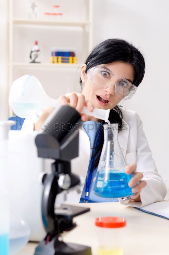 Similar – Image, Stock Photo Woman with papers in lab