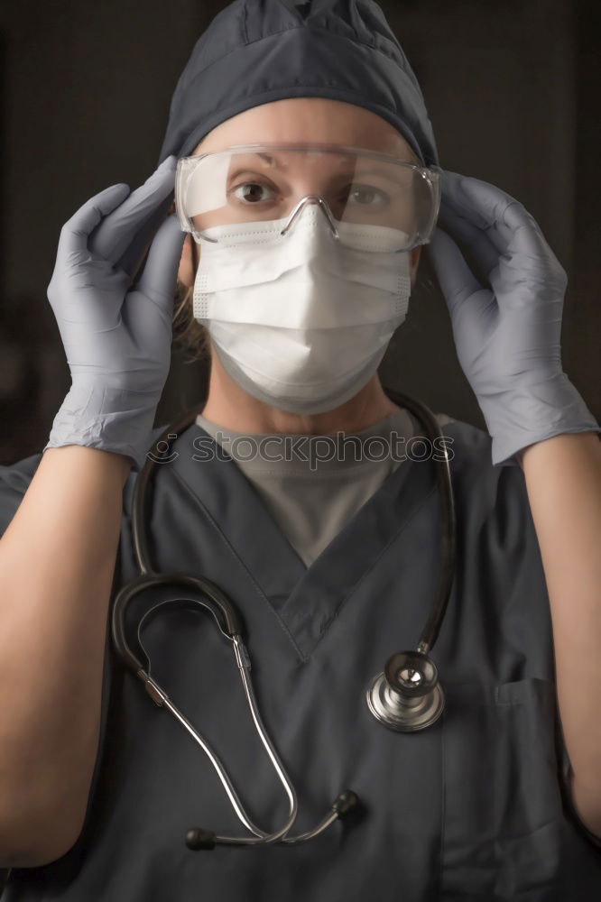 Similar – Foto Bild Konzentrierte Chirurgin bei der Arbeit