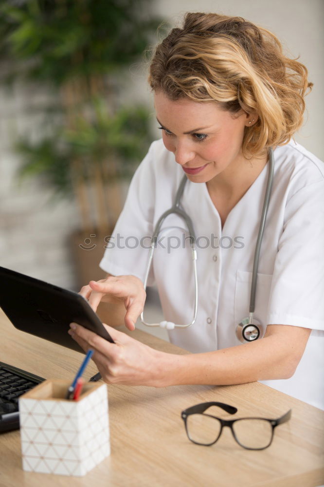 Similar – Image, Stock Photo Caregiver checking blood pressure to a senior woman