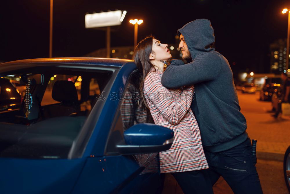 Similar – Young couple kissing through of glass car