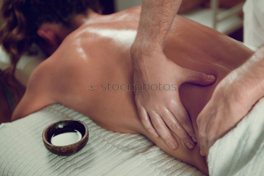 Similar – Image, Stock Photo Man enjoying a back massage