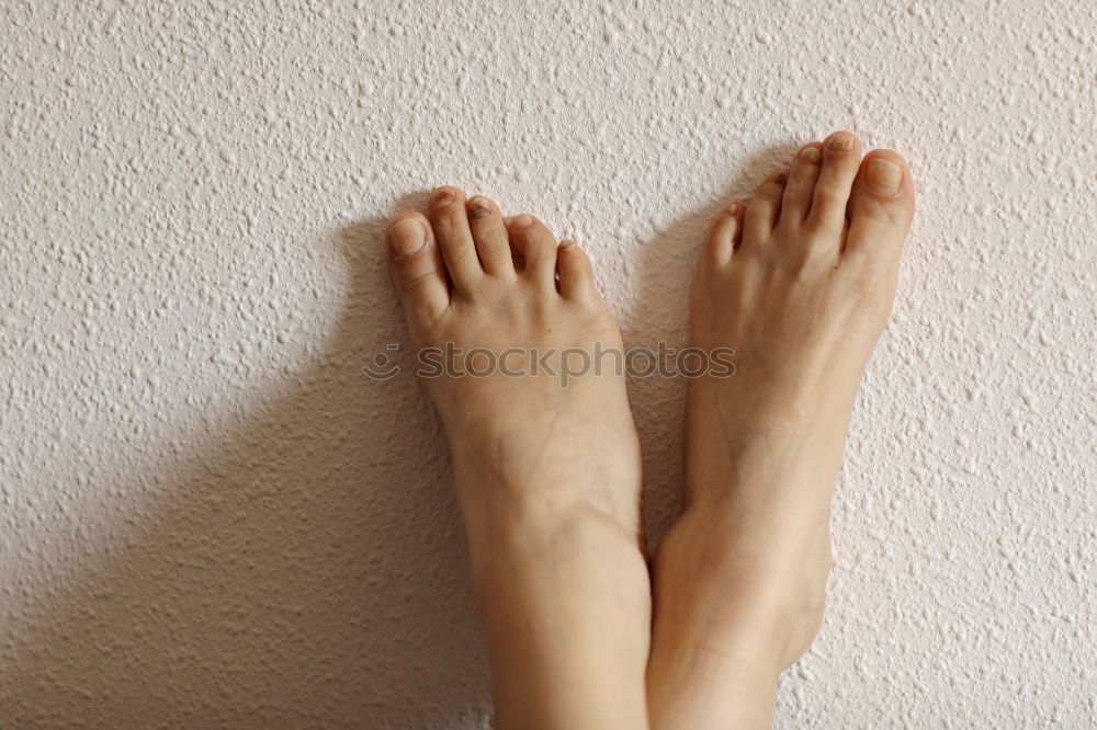 Similar – Image, Stock Photo Woman lying on wooden table with crossed naked strong legs