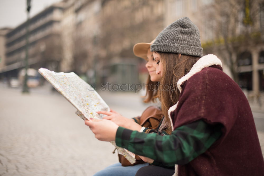 Similar – Attractive teenager sitting on steps in town