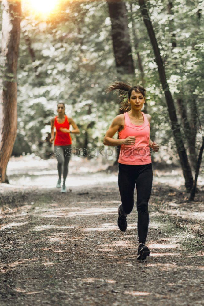 Similar – Image, Stock Photo Athletic woman out jogging in a forest